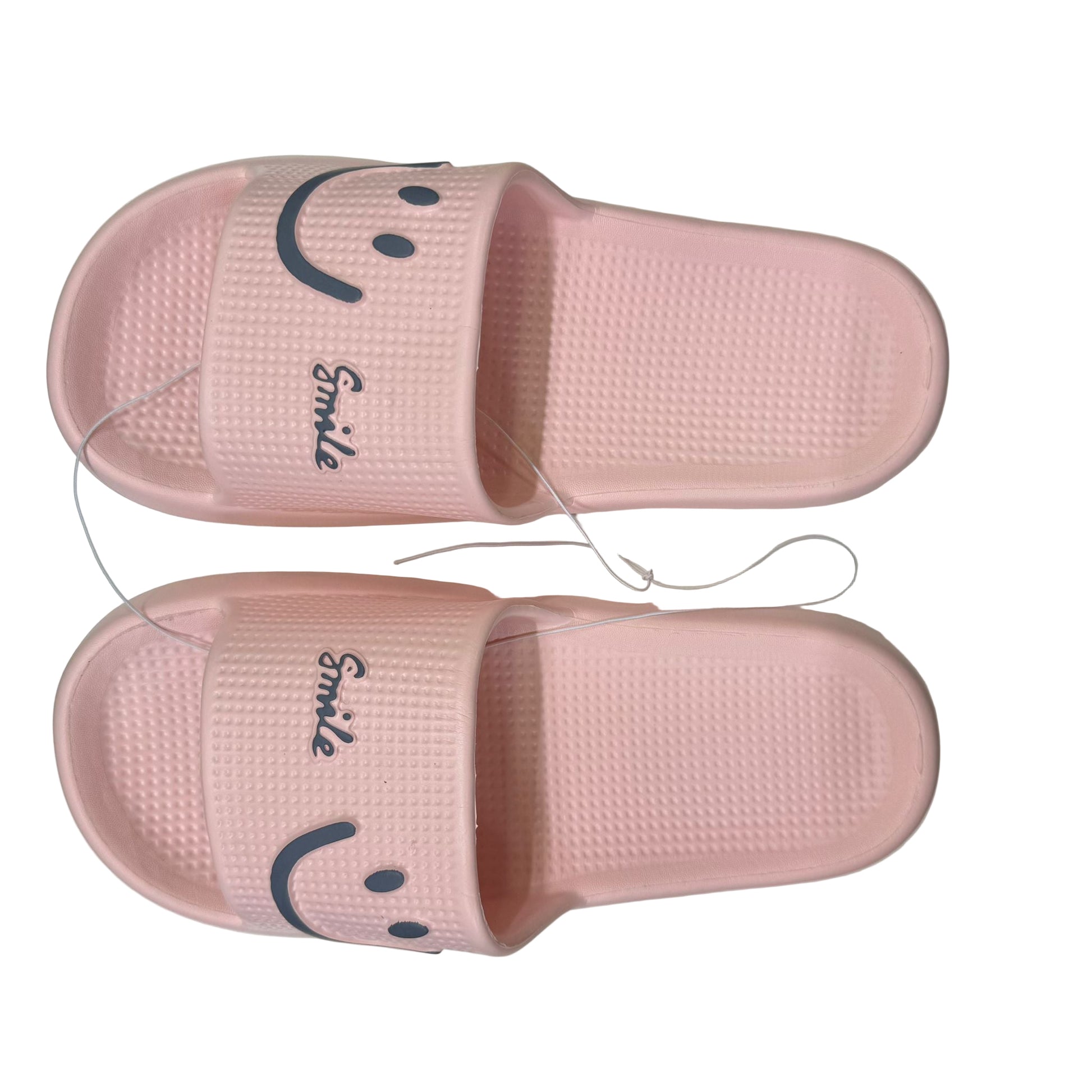 Pink slides with smiley face design on a white background