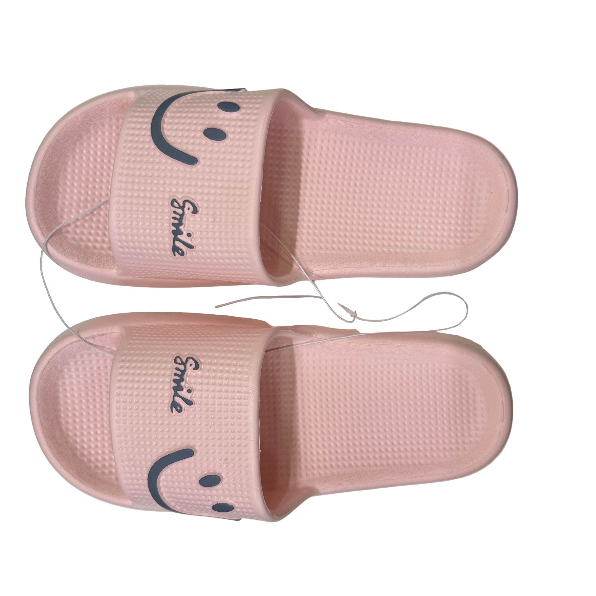 Pink slides with smiley face design on a white background