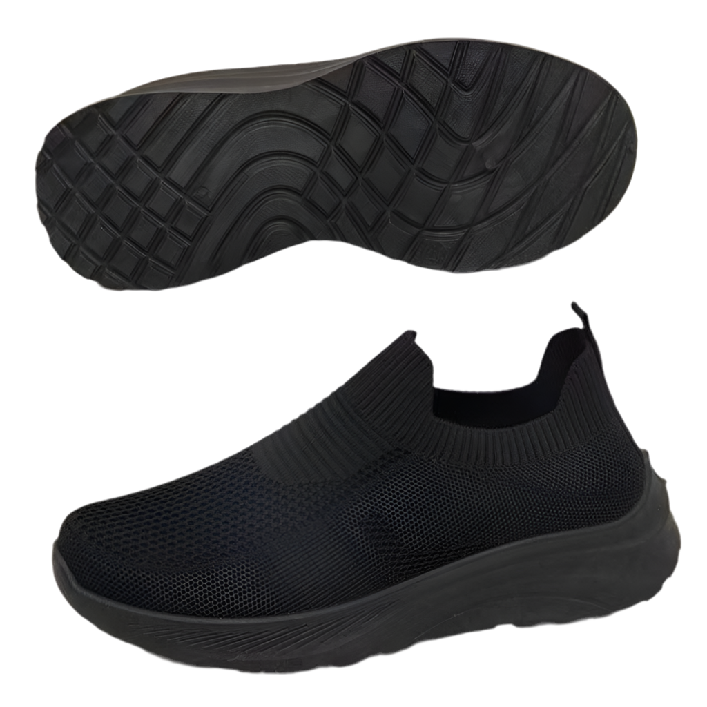 Black slip-on sneaker with sole showing texture on a white background