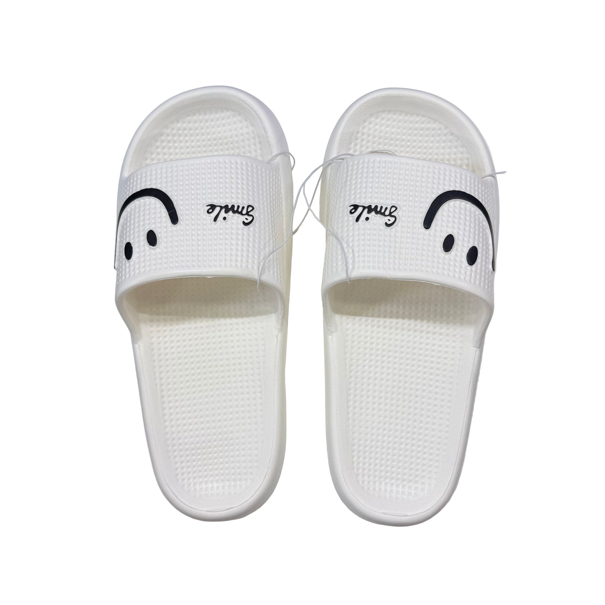 White slides with smiley face design on a white box