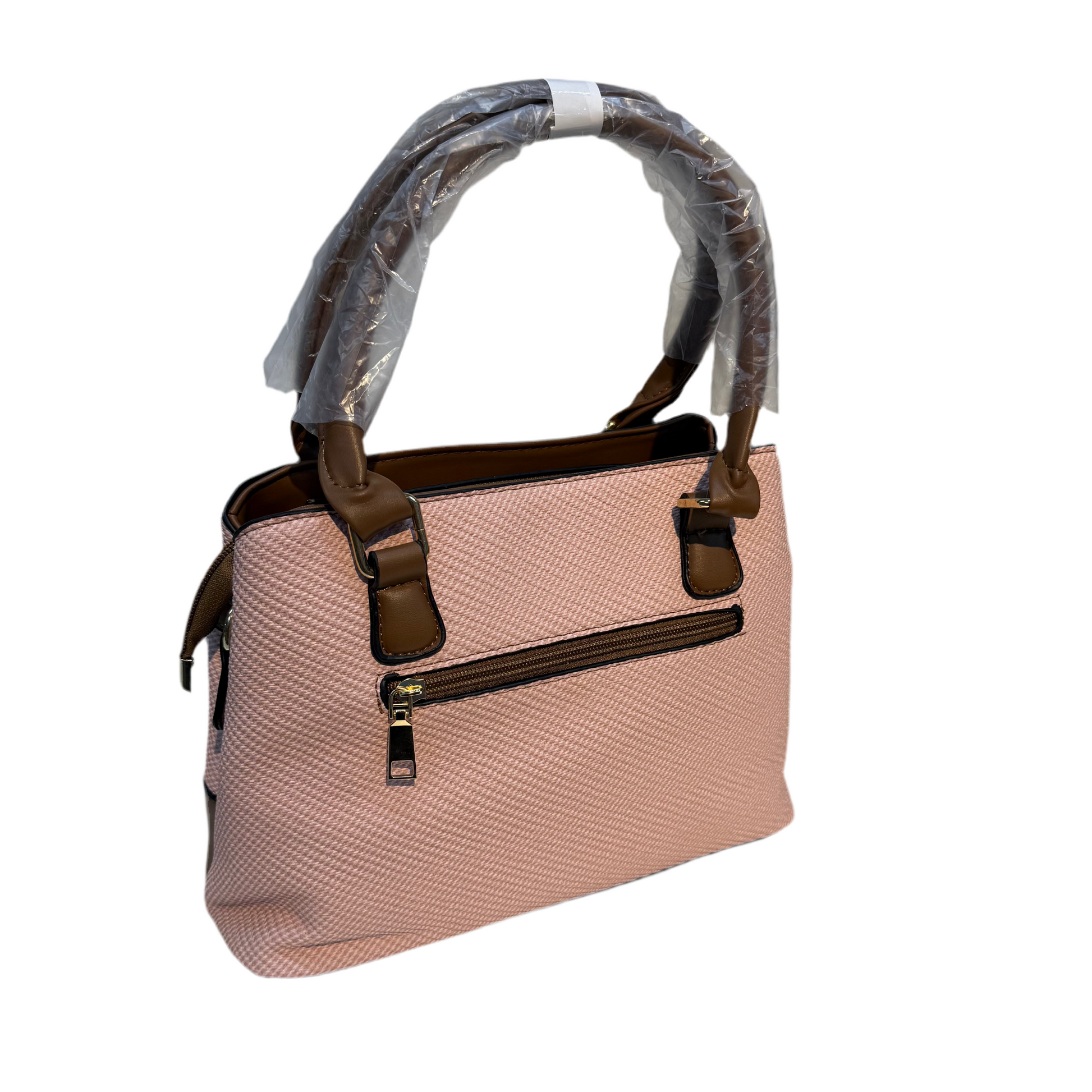 Pink handbag with brown accents on a white background