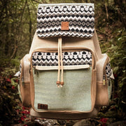 Backpack with patterned top section in a forest setting